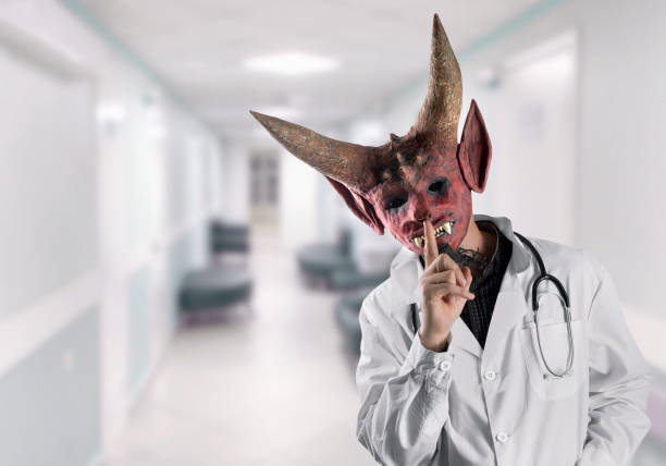 Not an honest doctor in a devil mask in a medical facility.
