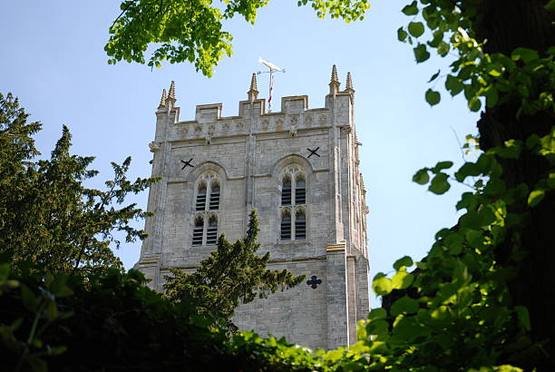 Christchurch Dorset The tower of the church at Christchurch, Dorset. christchurch england photos stock pictures, royalty-free photos & images