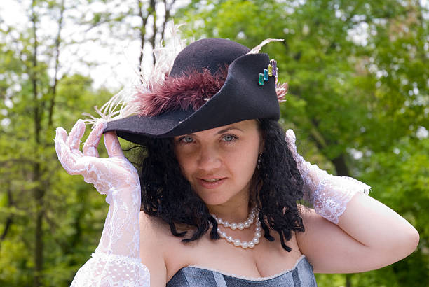 istock beautiful aristocratic woman with a hat 146069110