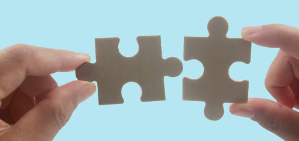 istock Connecting jigsaw puzzle. Business solutions success 1460692206