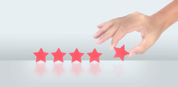 istock Rise on increasing five stars in human hand, Increase rating 1460692219