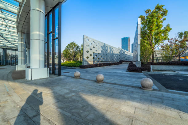 istock modern buildings and empty pavement in china 1460692842