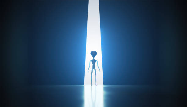 Silhouette of spooky alien. Bright light in background. 3D rendered illustration. stock photo