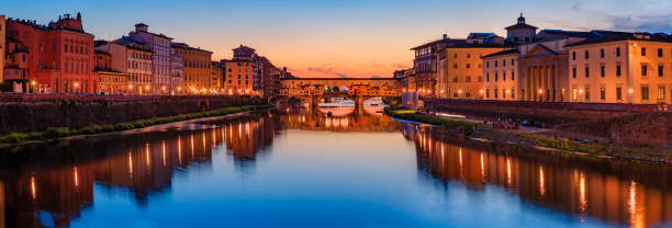 istock Famous Ponte Vecchio bridge on the river Arno River at sunset, Florence, Italy 1460694082