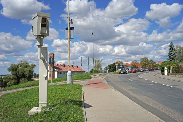 istock Automatic radar speed camera on street with speed limit 1460702153