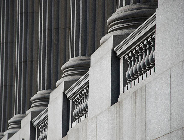 grey colonnade perspectiva - column legal system university courthouse - fotografias e filmes do acervo