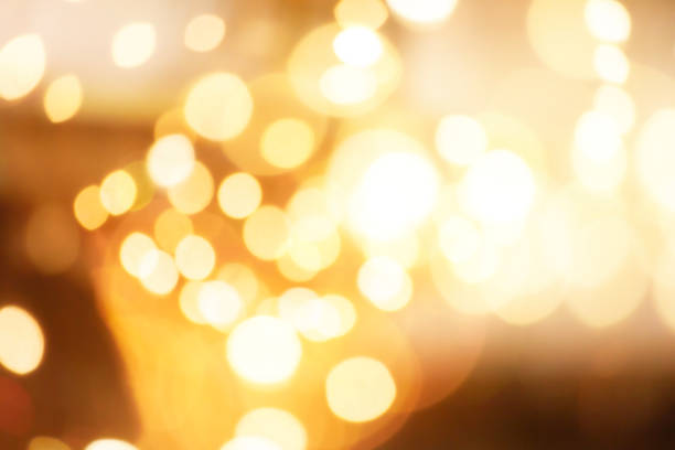 istock Sparkling golden bokeh background 1460707750