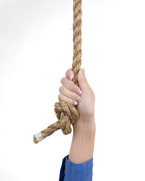 mujer en el final de la cuerda - tied knot rope adversity emotional stress fotografías e imágenes de stock
