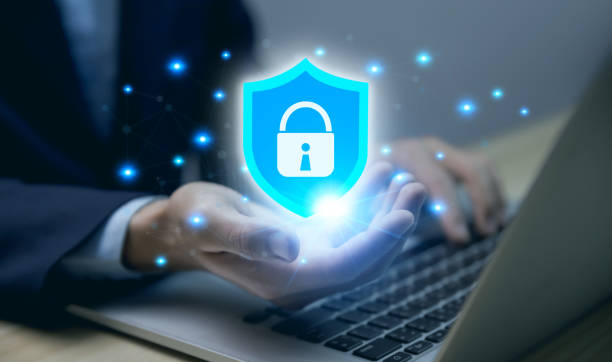 istock Businessman hand showing shield icon with blue lock sign, internet network security computer password protection 1460709875