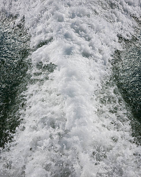 Stern wash from a single engine powerboat stock photo