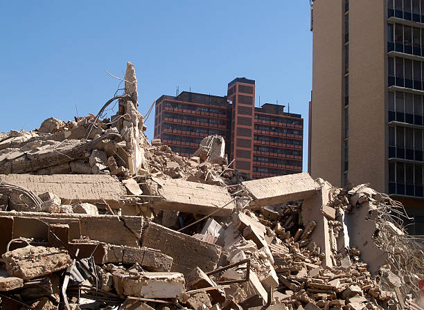 Piles of concrete rubble after implosion stock photo