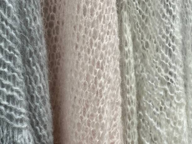 istock Light mohair scarf, knitted wool downy shawl, handmade openwork binding. 1460711157