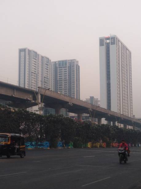 Thane metro construction view with skyrise buildings eastern express highway