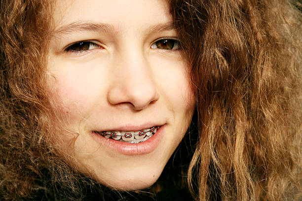 istock Young Girl with Braces 146071536