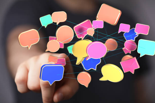istock Person presenting a 3D rendered projection of colorful speech bubbles 1460716851