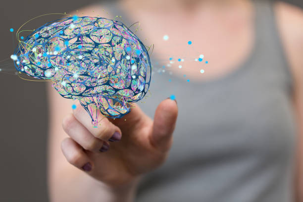 istock Person presenting the virtual 3D rendered projection of the human brain and AI 1460716982
