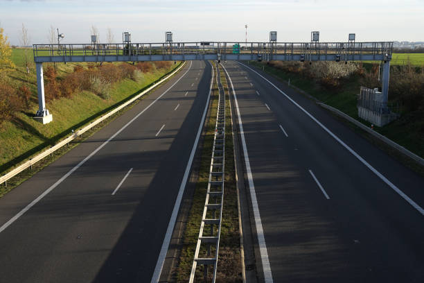 Electronic toll collection system on motorway in Czech Republic, gate with license plate cameras, vehicle detector and antennas