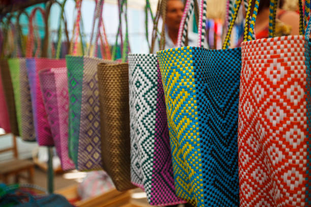 istock Beautiful vibrant handmade bags in a store 1460717929