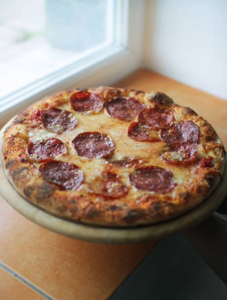 istock Homemade pepperoni pizza with napolitan dough 1460719362