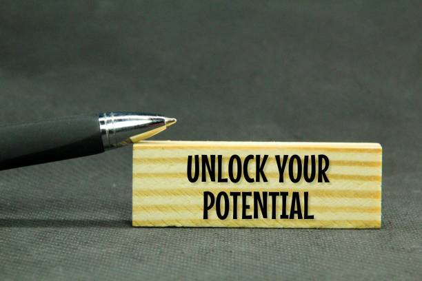 istock pen and wooden board with the words unlock your potential 1460719511