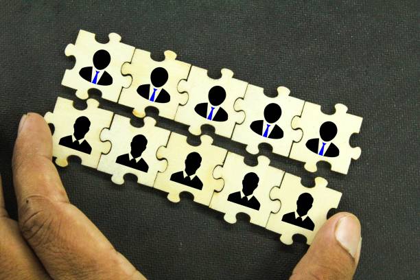 istock Puzzles with group and group icons. The concept of teamwork 1460720597