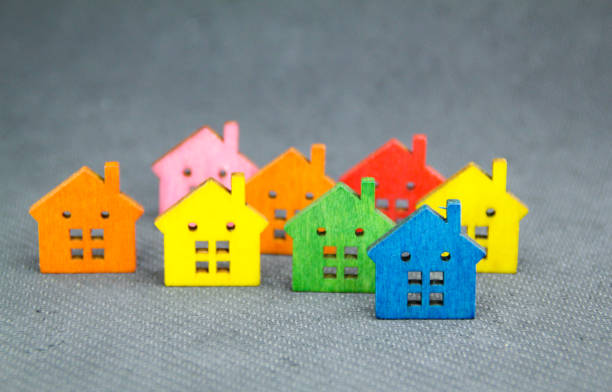 istock the shape of a small colored house with a housing concept. Selective focus 1460721150