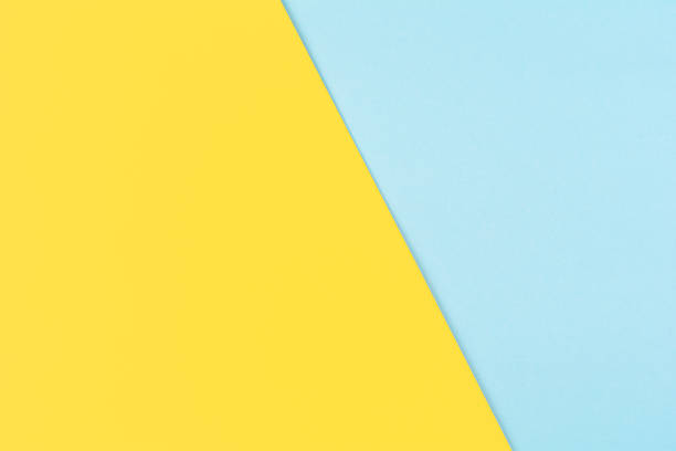 istock Yellow and blue paper background 1460721924