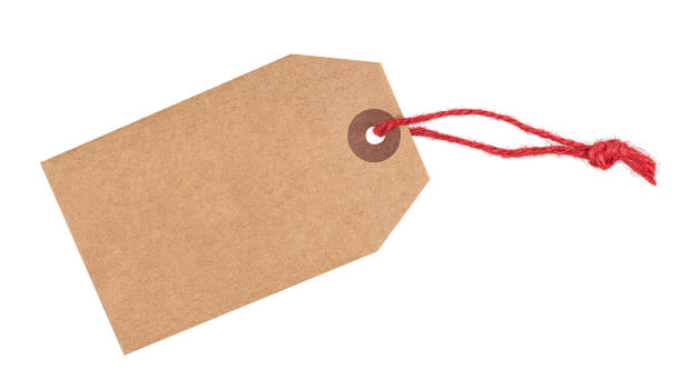 Brown paper tag isolated on white background Recycled paper tag with red twine isolated on white background, copy space old luggage tag stock pictures, royalty-free photos & images