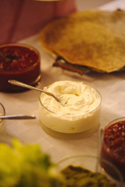 istock Vertical high angle closeup shot of a white dip on a table 1460724014