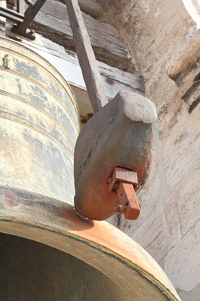 Hammer hitting a bell. stock photo