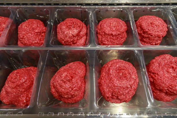 istock Packaging line of chicken minced meat. 1460725781