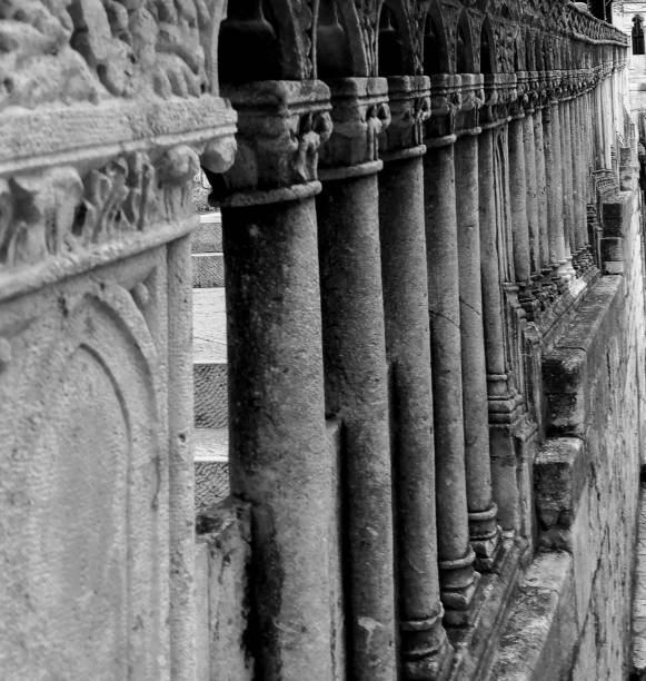 istock Vertical grayscale shot of a row of columns. 1460726916