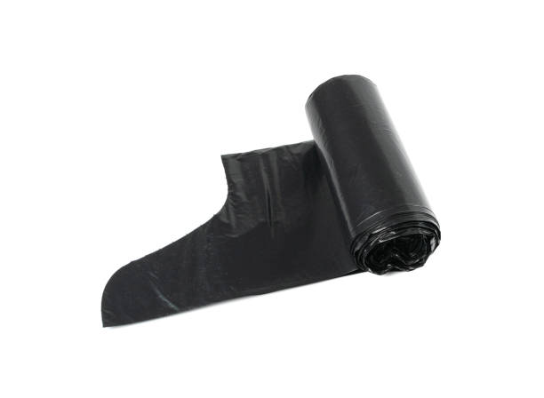 istock Garbage Bag Roll Isolated. Trash Package, New Rolled Plastic Bin Bags, Black Polyethylene Waste Container 1460726930