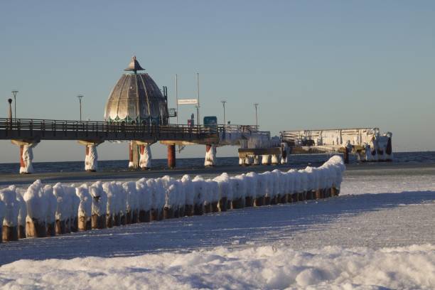 Big Diving gondola at the pier Zingst, Germany with icicles on it