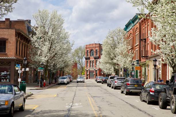 Road surrounded by buildings in Beacon Beacon, United States – April 19, 2019: A road surrounded by buildings in Beacon beacon ny stock pictures, royalty-free photos & images