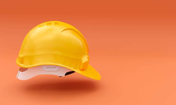 istock 3d illustration of a plastic safety helmet on an orange background 1460727607