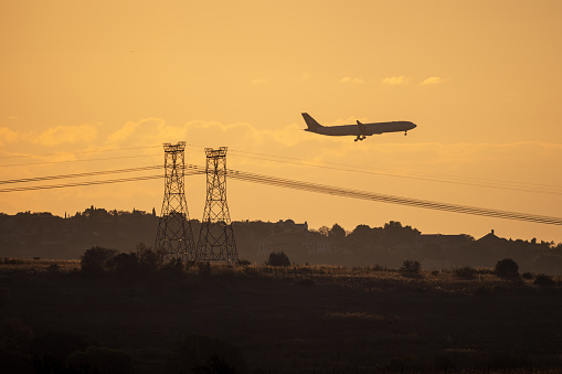 A South African airplane taking off and flying over the city of Pretoria.