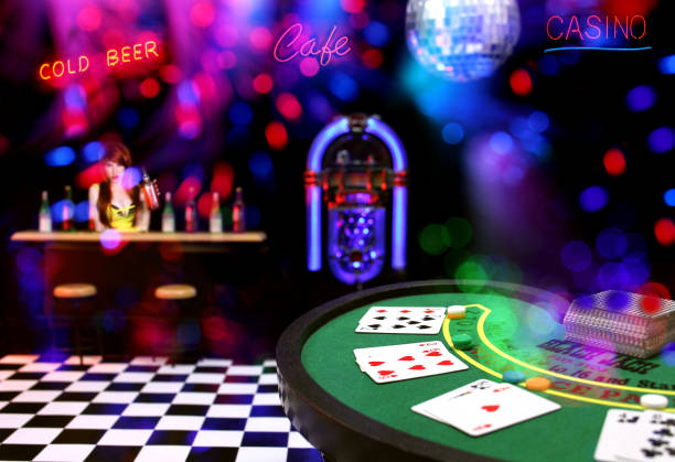 istock Miniature poker table and bar scene with neon signs above 1460730077