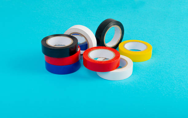 istock Electrical Tape Isolated, Plastic Duct Tape Rolls, Colored Adhesive Tapes on White Background 1460730822