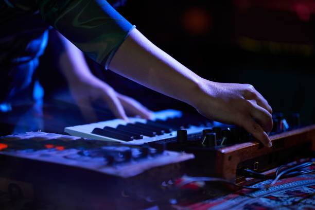 istock Closeup of a musician playing on a keyboard 1460732529