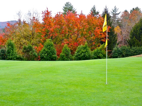 A green golf course in autumn in Western North Carolina