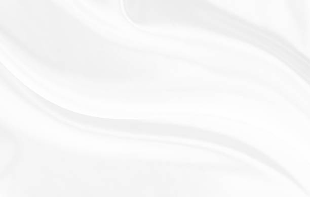 istock White gray satin texture that is white silver fabric silk background with beautiful soft blur pattern natural. 1460735076