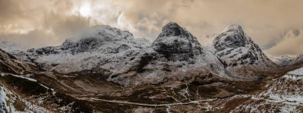 istock Aerial view of snow covered mountain landscape during sunset 1460735113