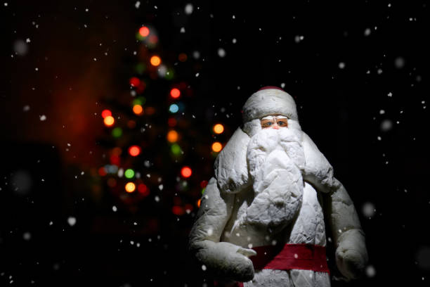 istock Santa Claus decoration with Christmas tree on the background 1460741187