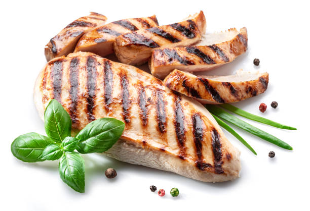 istock Grilled chicken fillet with herbs isolated on white background. 1460741289