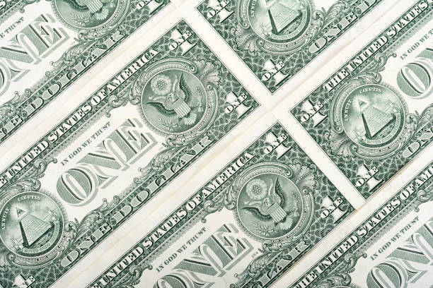 istock Bunch of US dollar banknotes 1460743723