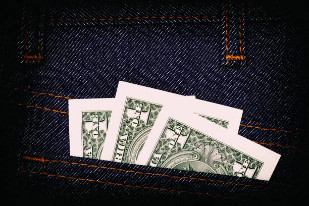 closeup of credit card in jeans trousers pocket