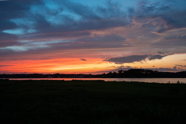 istock Beautiful landscape with sunset sky. 1460744249
