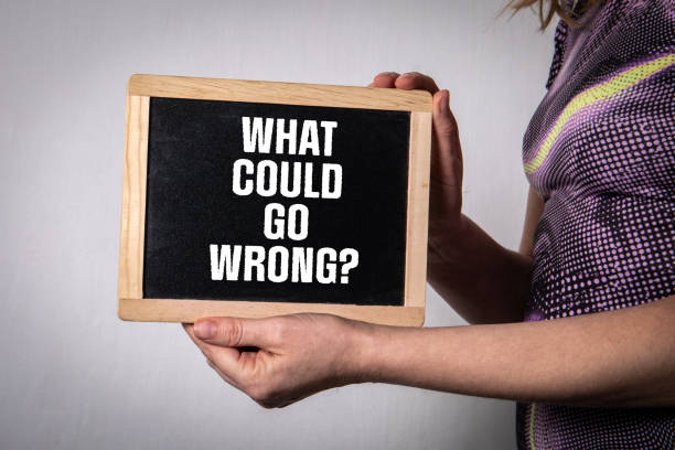 istock What Could Go Wrong. Business concept. Text on a chalk board 1460744264