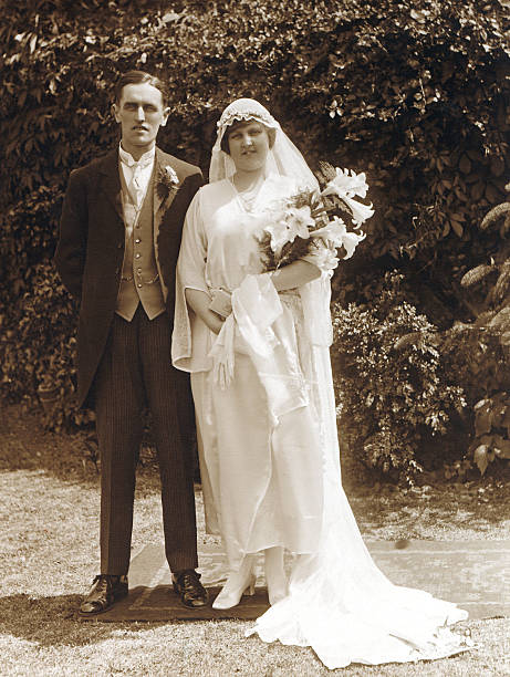 Victorian Edwardian People - Wedding Couple Edwardian Wedding Couple circa 1920. wedding dress photos stock pictures, royalty-free photos & images